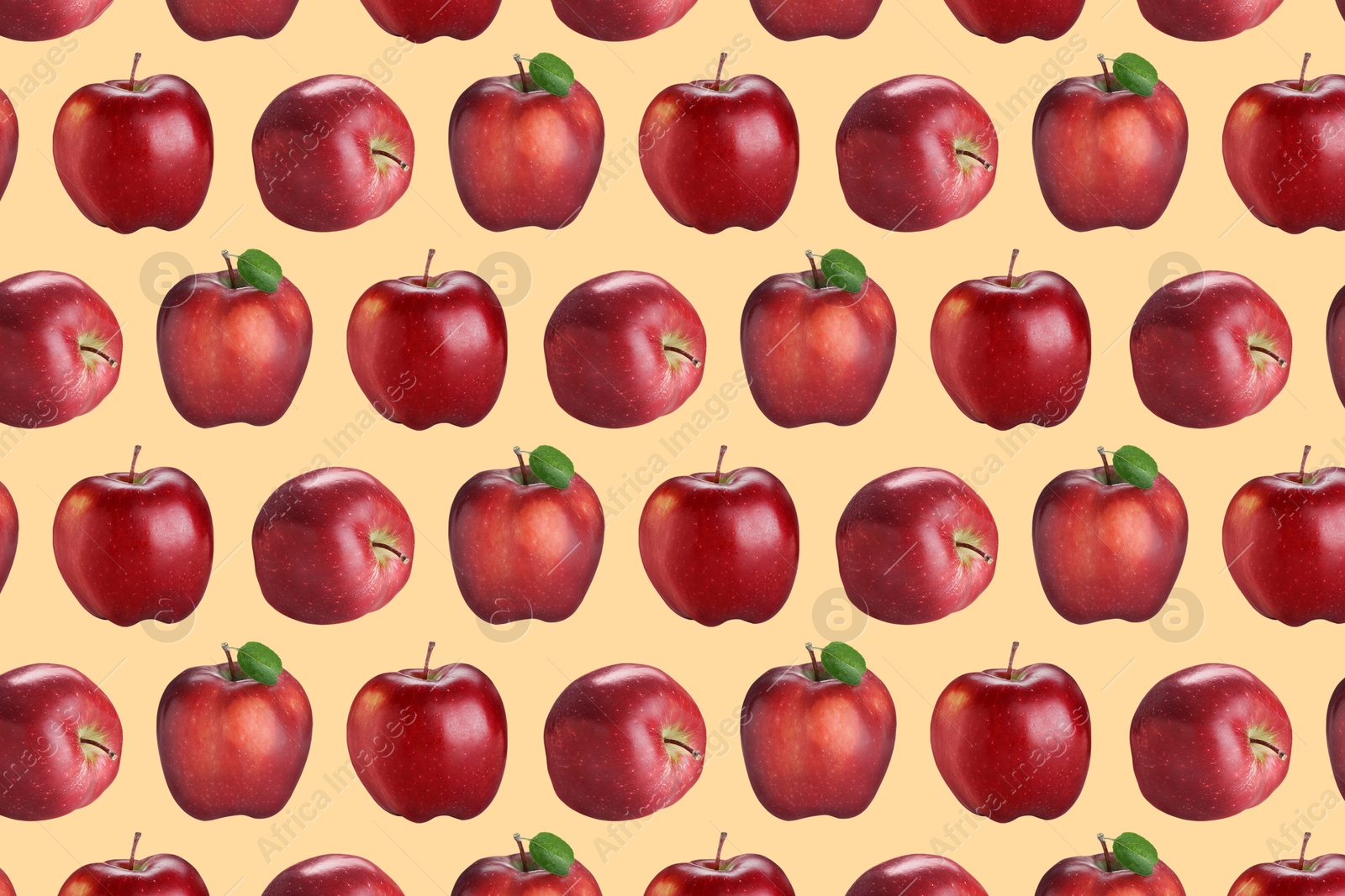 Image of Pattern of fresh red apples on pink beige background