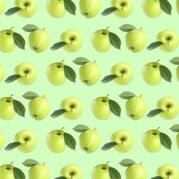 Image of Pattern of fresh apples on light green background