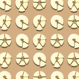 Image of Pattern of fresh apple slices on beige background