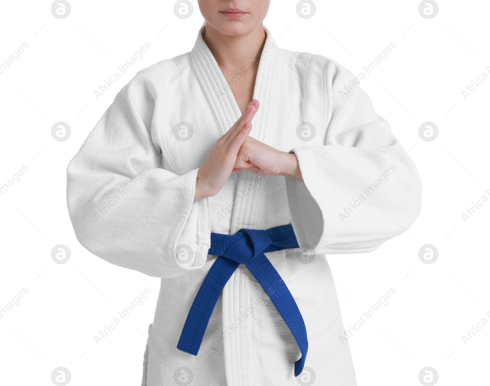 Photo of Karate fighter in kimono isolated on white, closeup