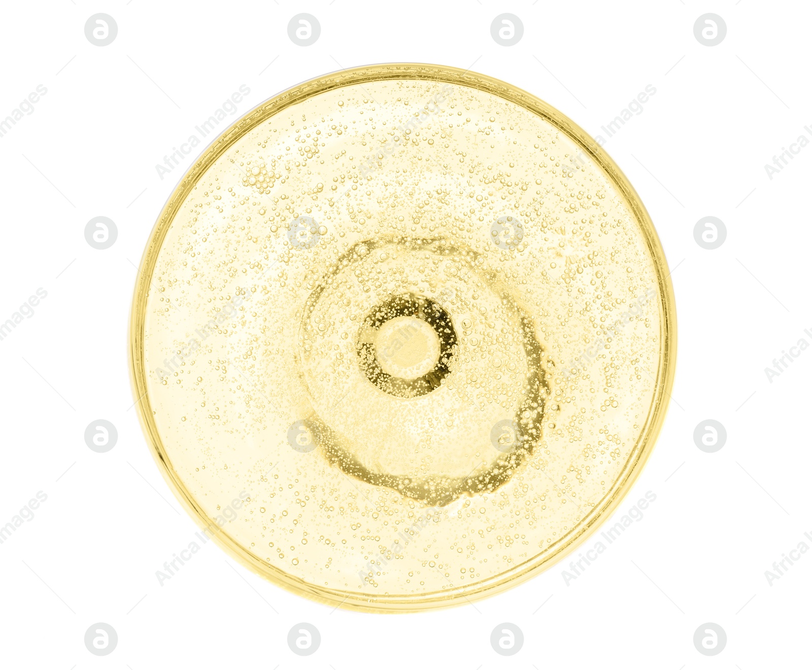 Photo of Champagne in glass isolated on white, top view