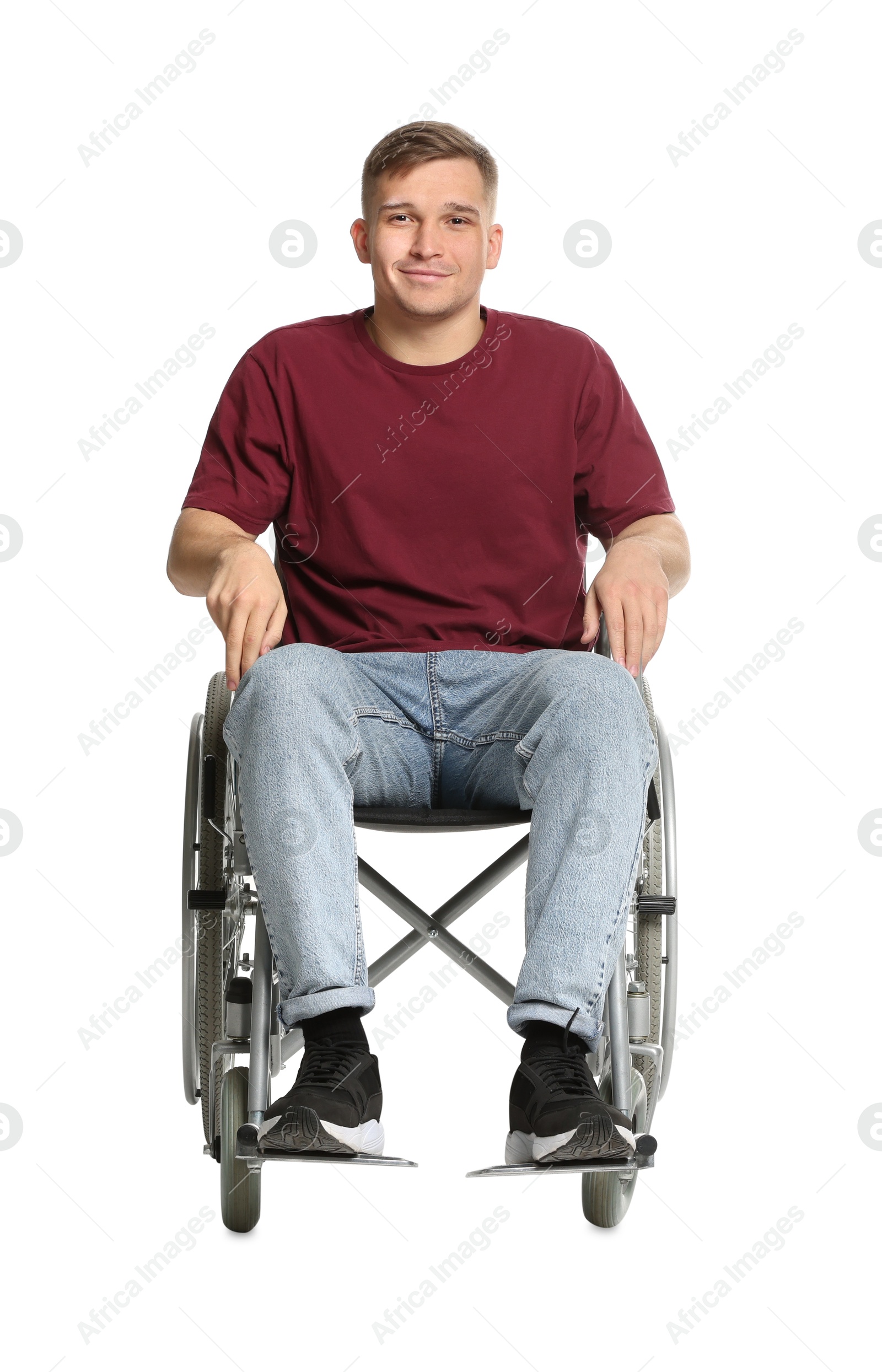 Photo of Young man in wheelchair on white background