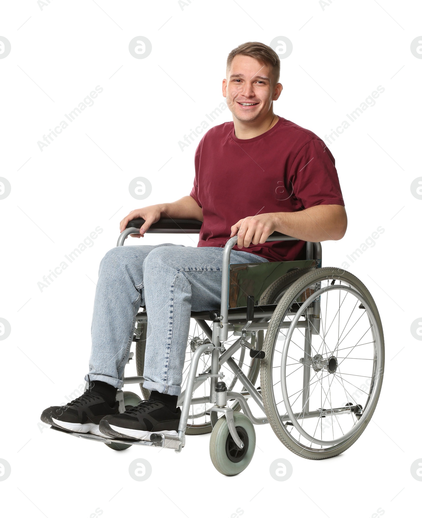 Photo of Smiling man in wheelchair on white background