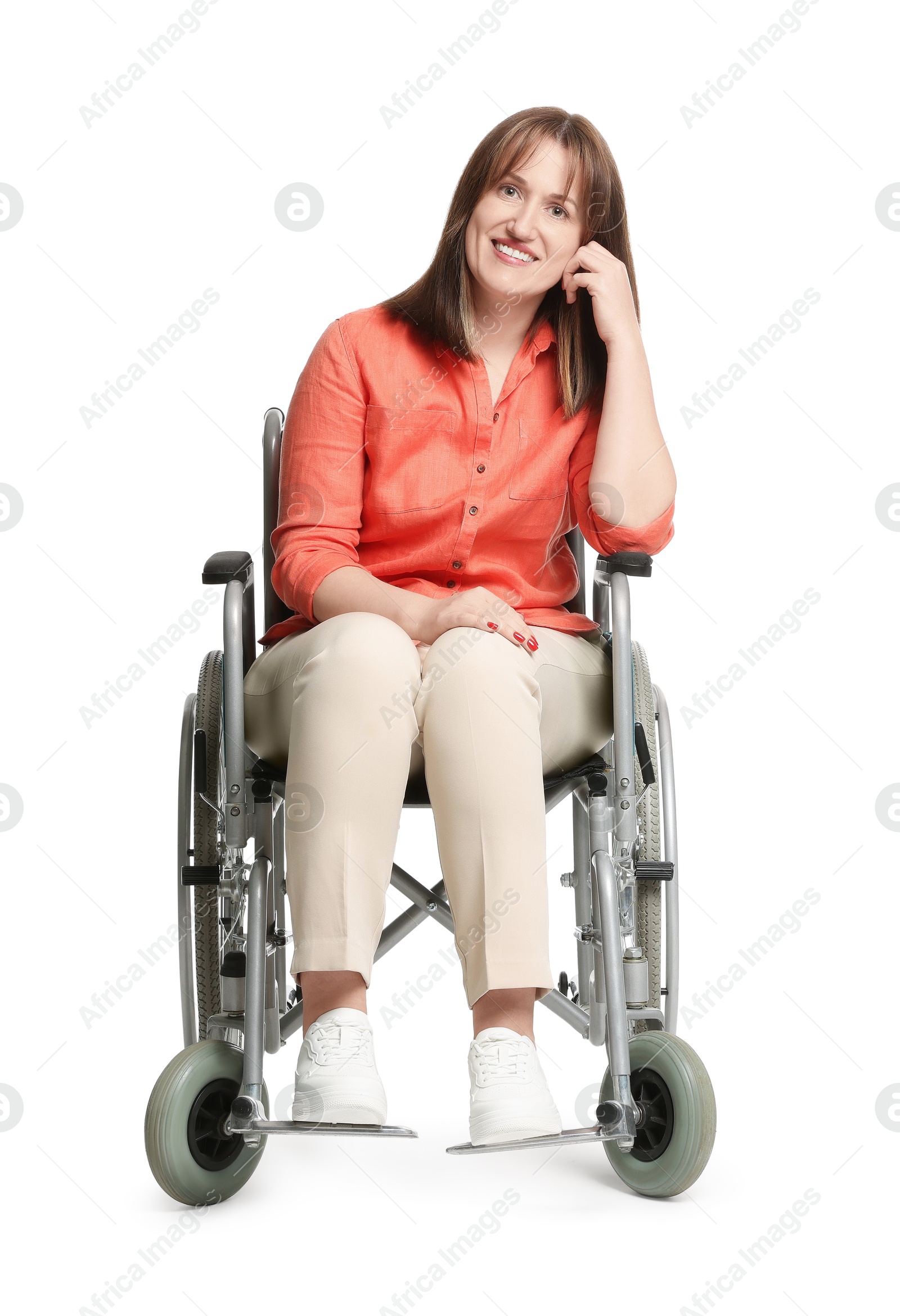 Photo of Smiling woman in wheelchair on white background