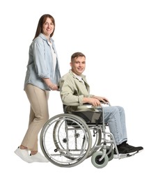 Photo of Caregiver with man in wheelchair on white background