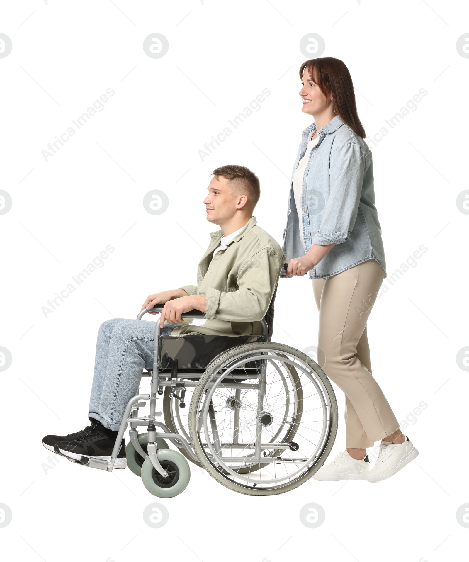 Photo of Caregiver with man in wheelchair on white background