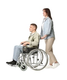 Photo of Caregiver with man in wheelchair on white background