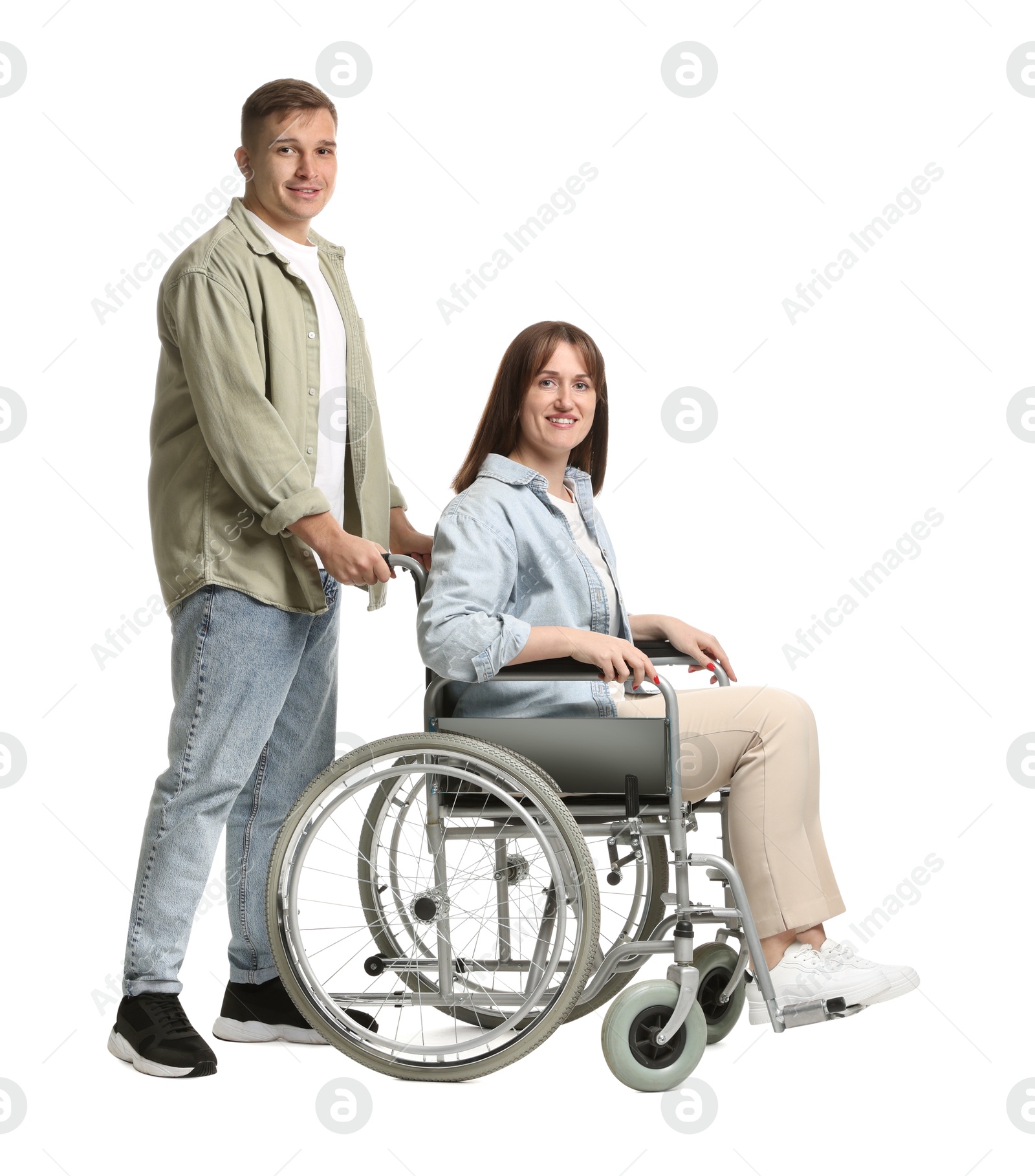 Photo of Caregiver with woman in wheelchair on white background