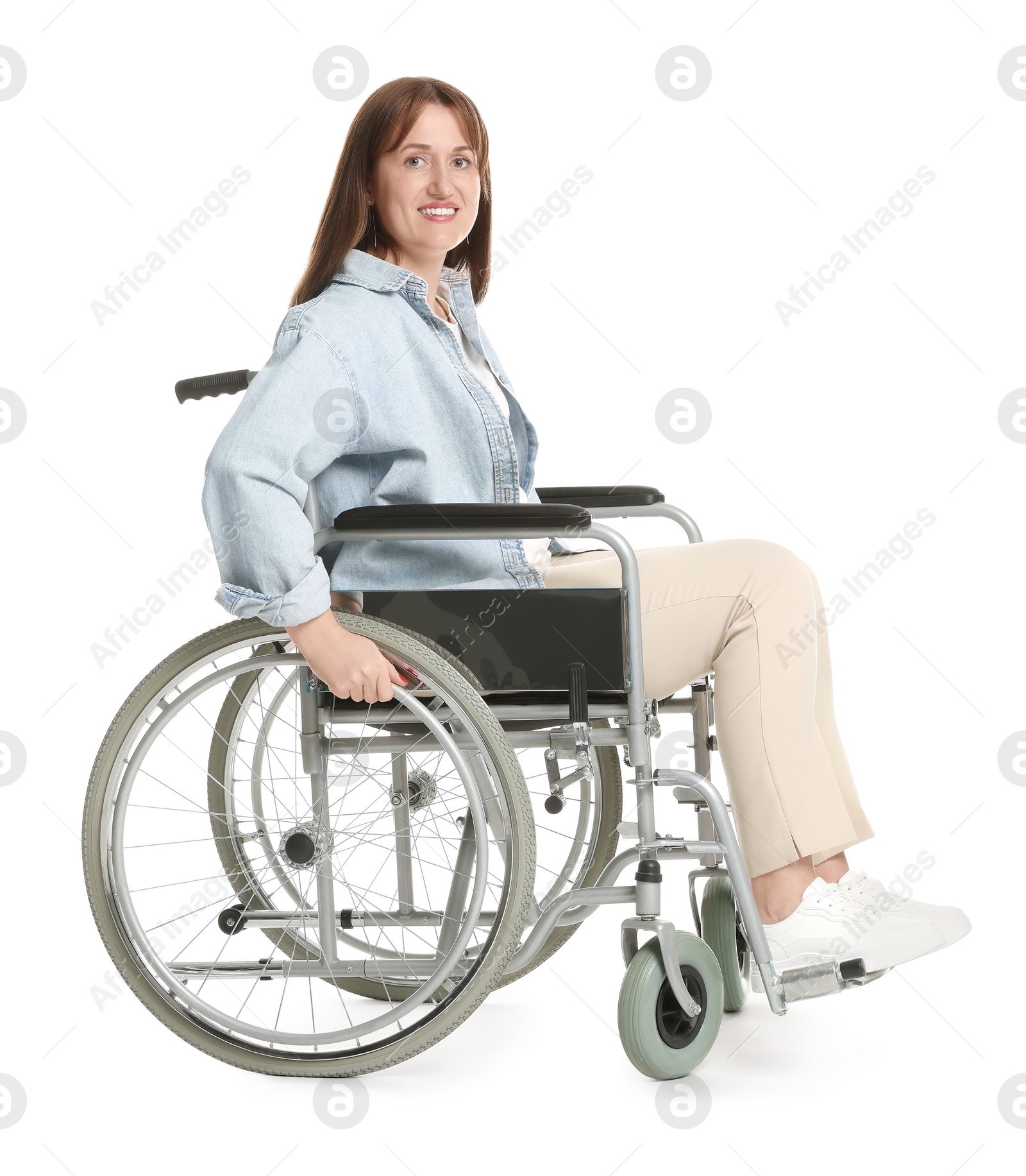 Photo of Smiling woman in wheelchair on white background