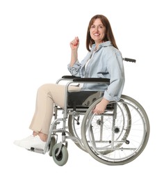 Smiling woman in wheelchair on white background