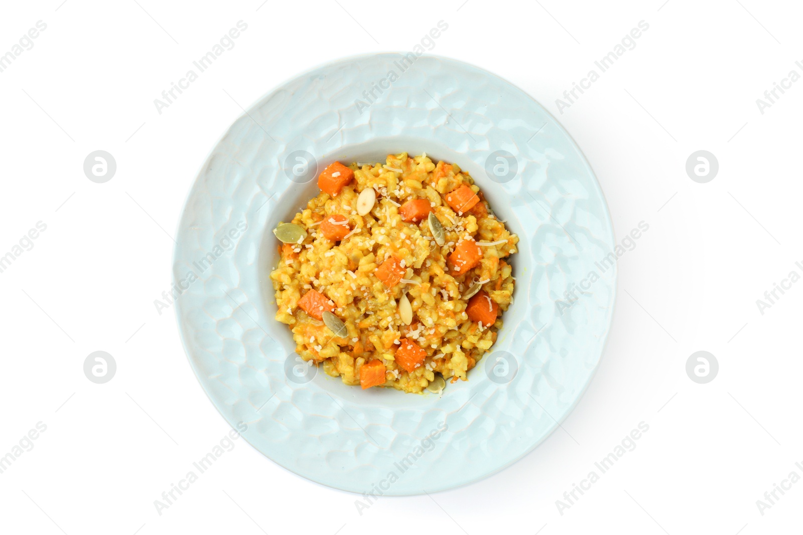 Photo of Delicious pumpkin risotto in bowl isolated on white, top view