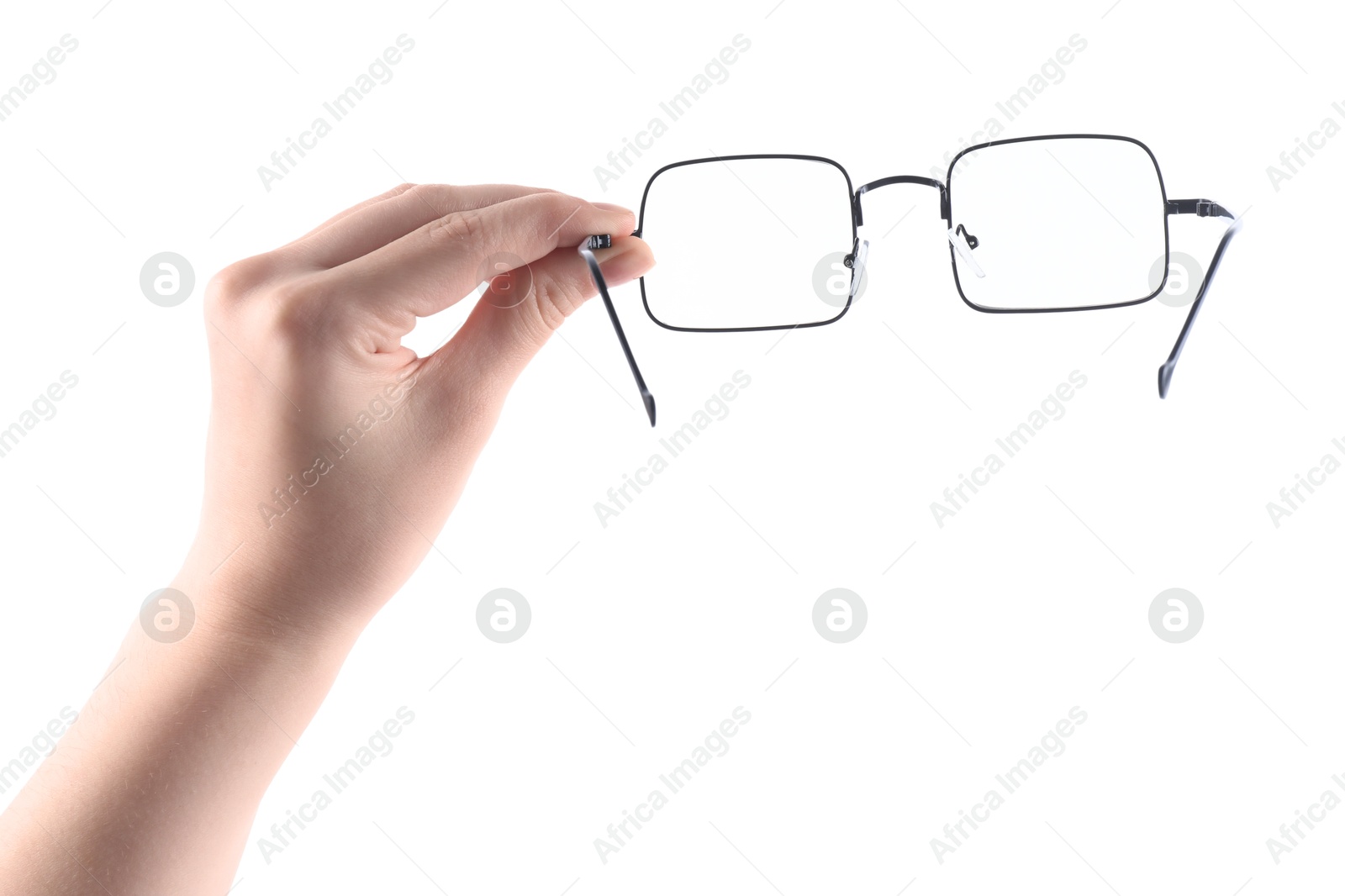 Photo of Woman holding glasses with black metal frame on white background, closeup