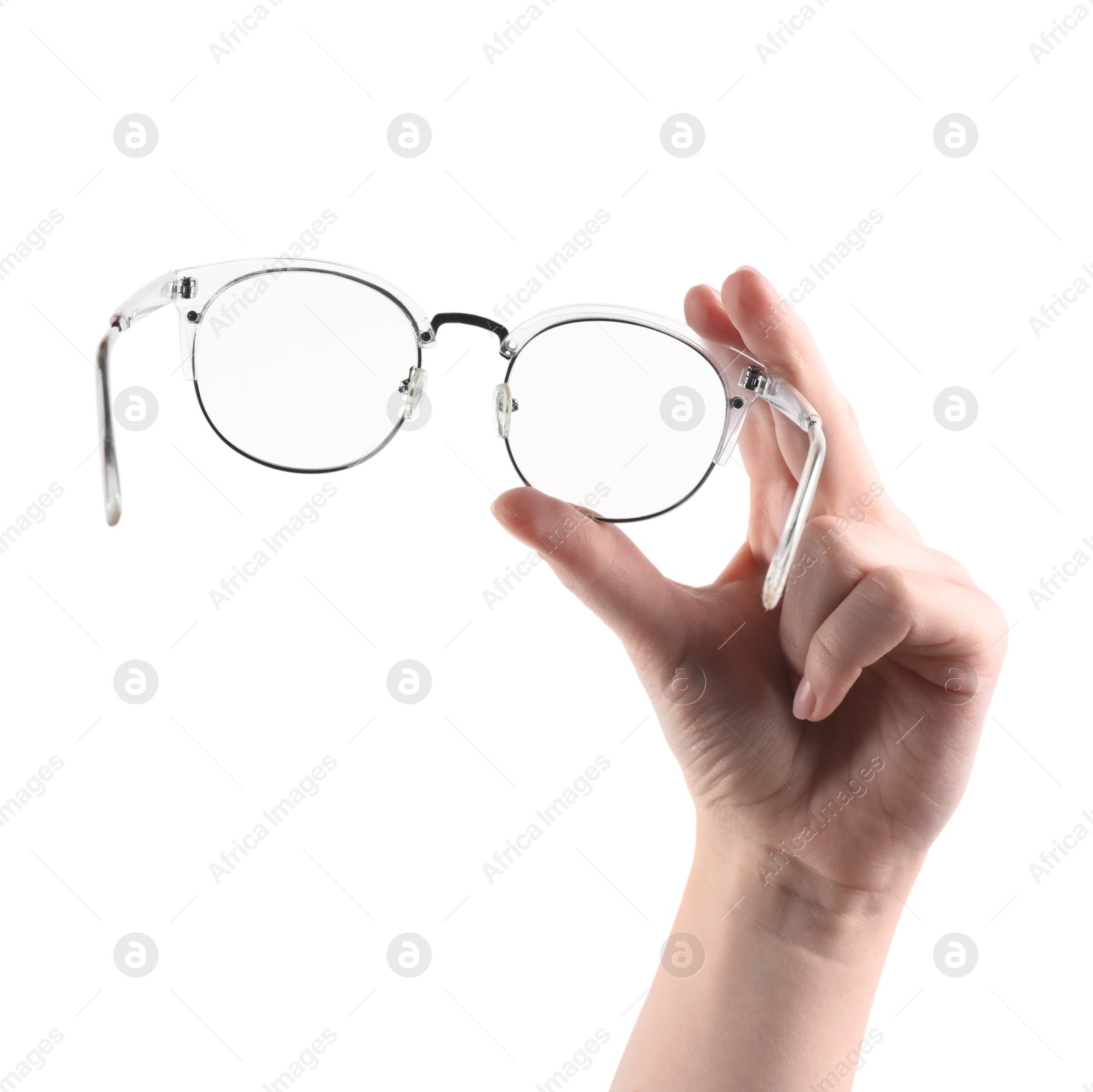 Photo of Woman holding glasses with stylish transparent frame on white background, closeup