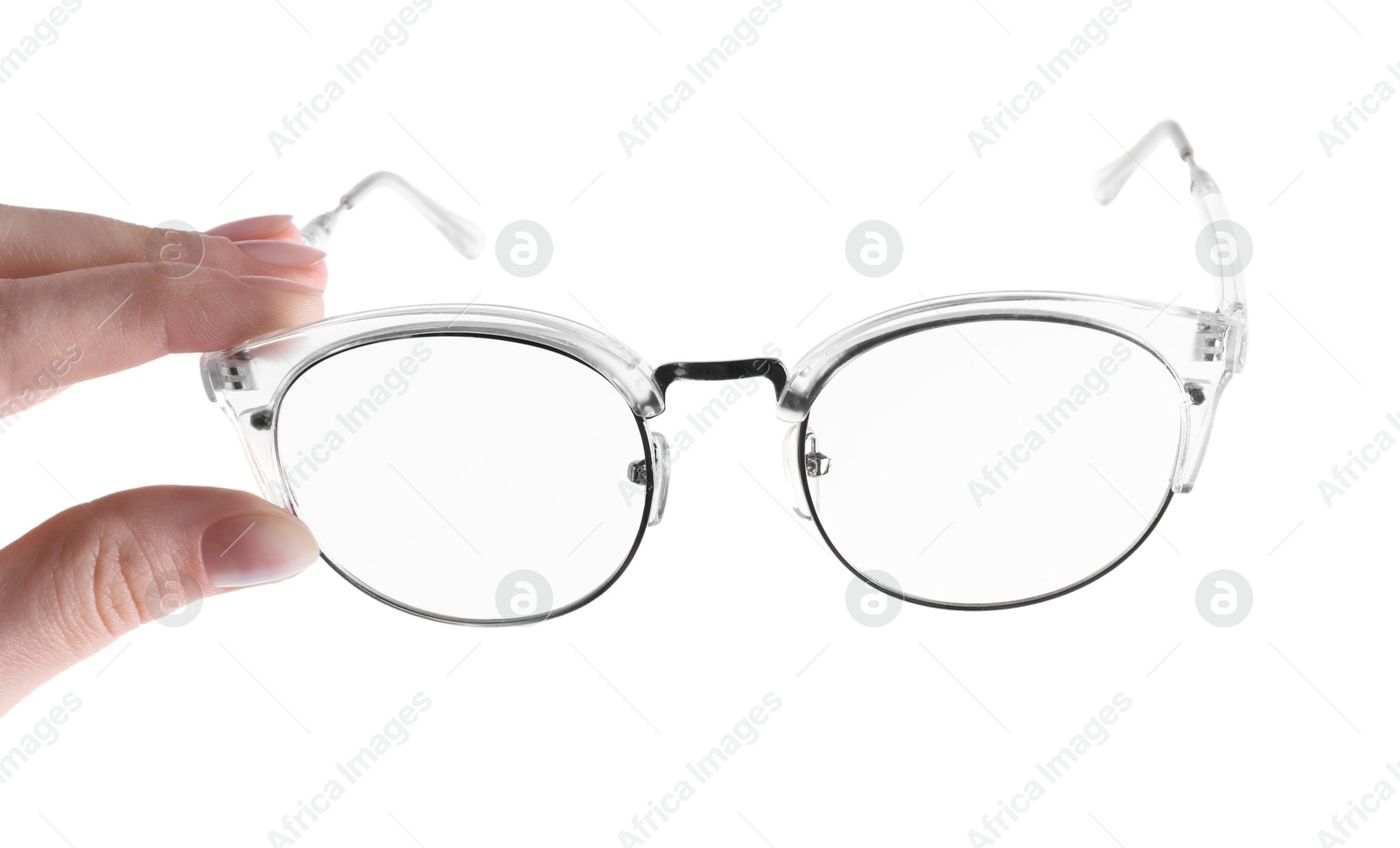 Photo of Woman holding glasses with stylish transparent frame on white background, closeup