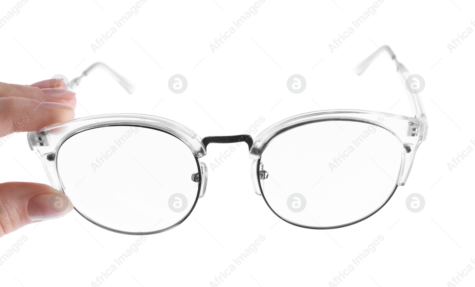 Photo of Woman holding glasses with stylish transparent frame on white background, closeup