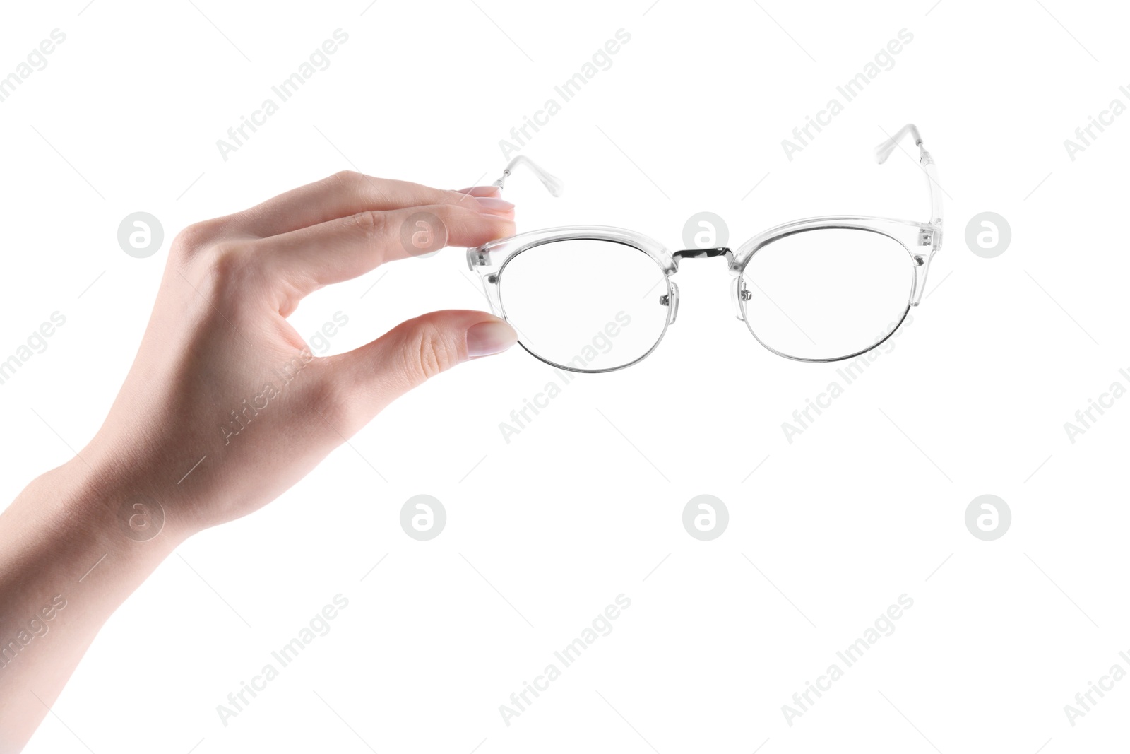 Photo of Woman holding glasses with stylish transparent frame on white background, closeup