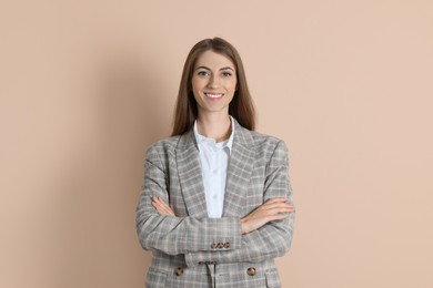 Photo of Portrait of smiling banker on beige background