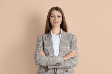 Photo of Portrait of smiling banker on beige background