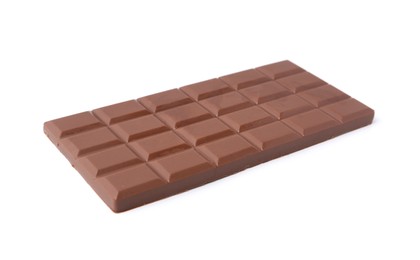 Photo of Delicious milk chocolate bar isolated on white