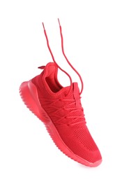 Photo of One stylish red sneaker isolated on white