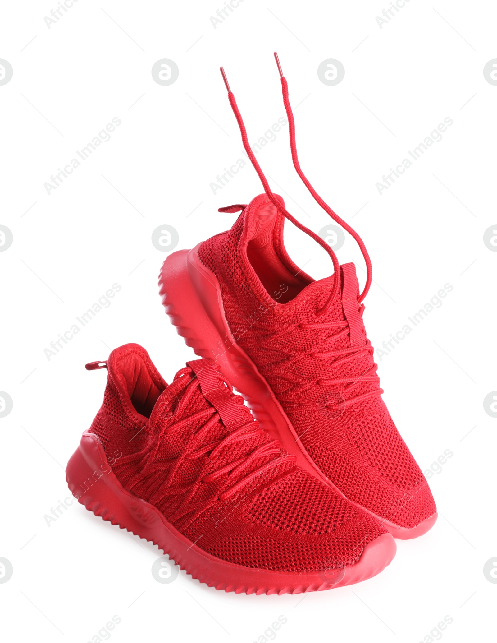 Photo of Pair of stylish red sneakers isolated on white