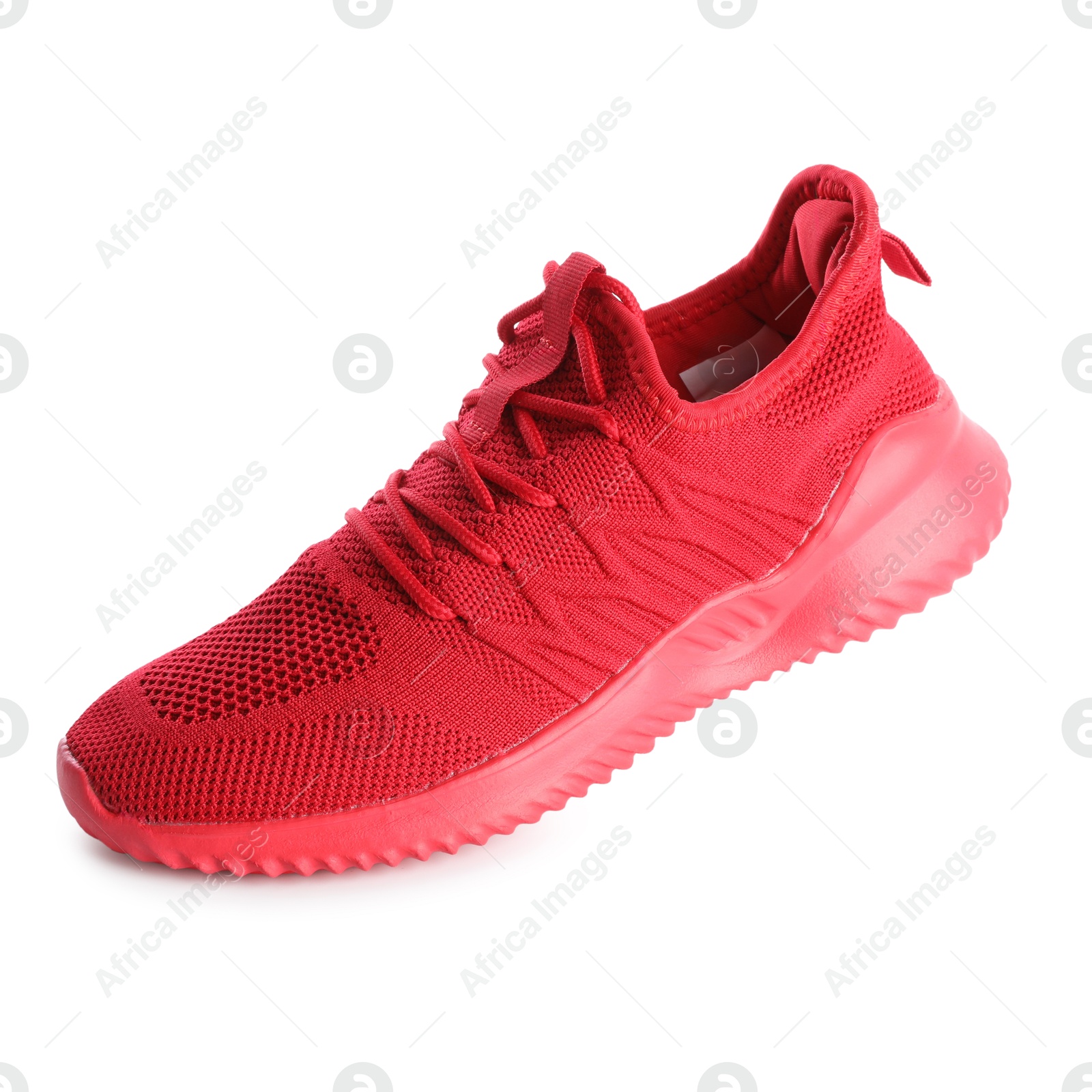 Photo of One stylish red sneaker isolated on white