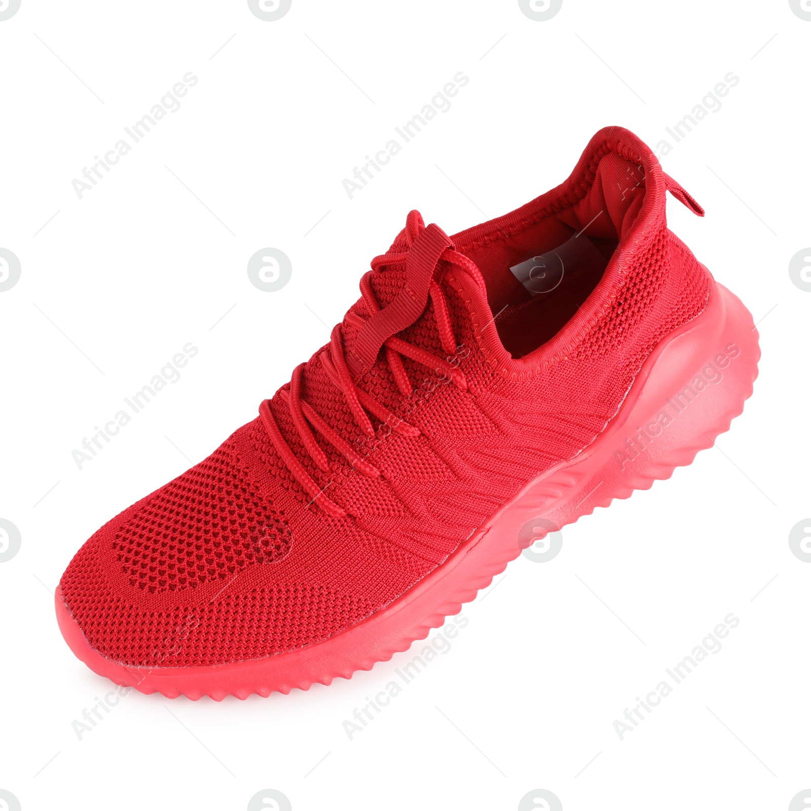 Photo of One stylish red sneaker isolated on white