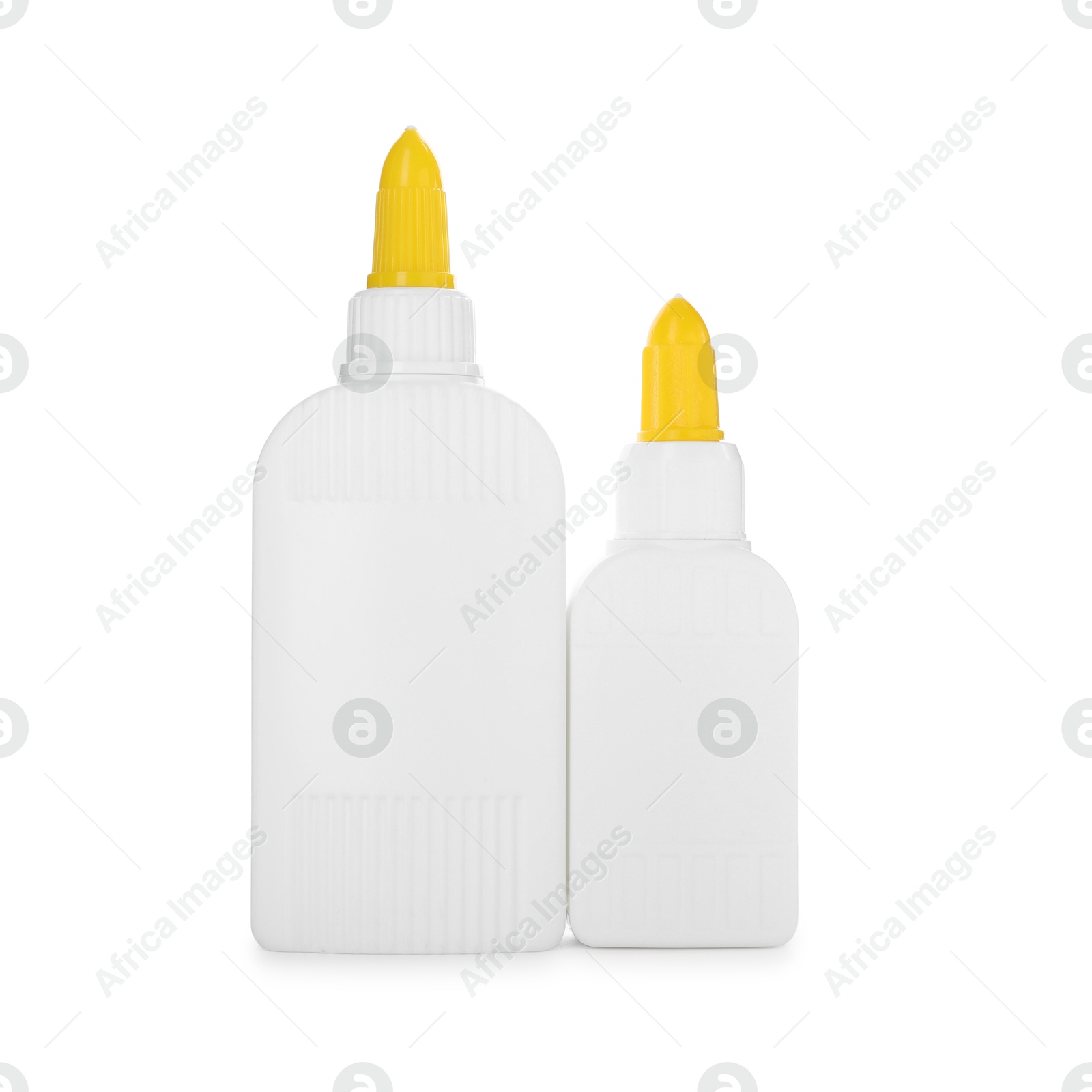 Photo of Two bottles of glue isolated on white