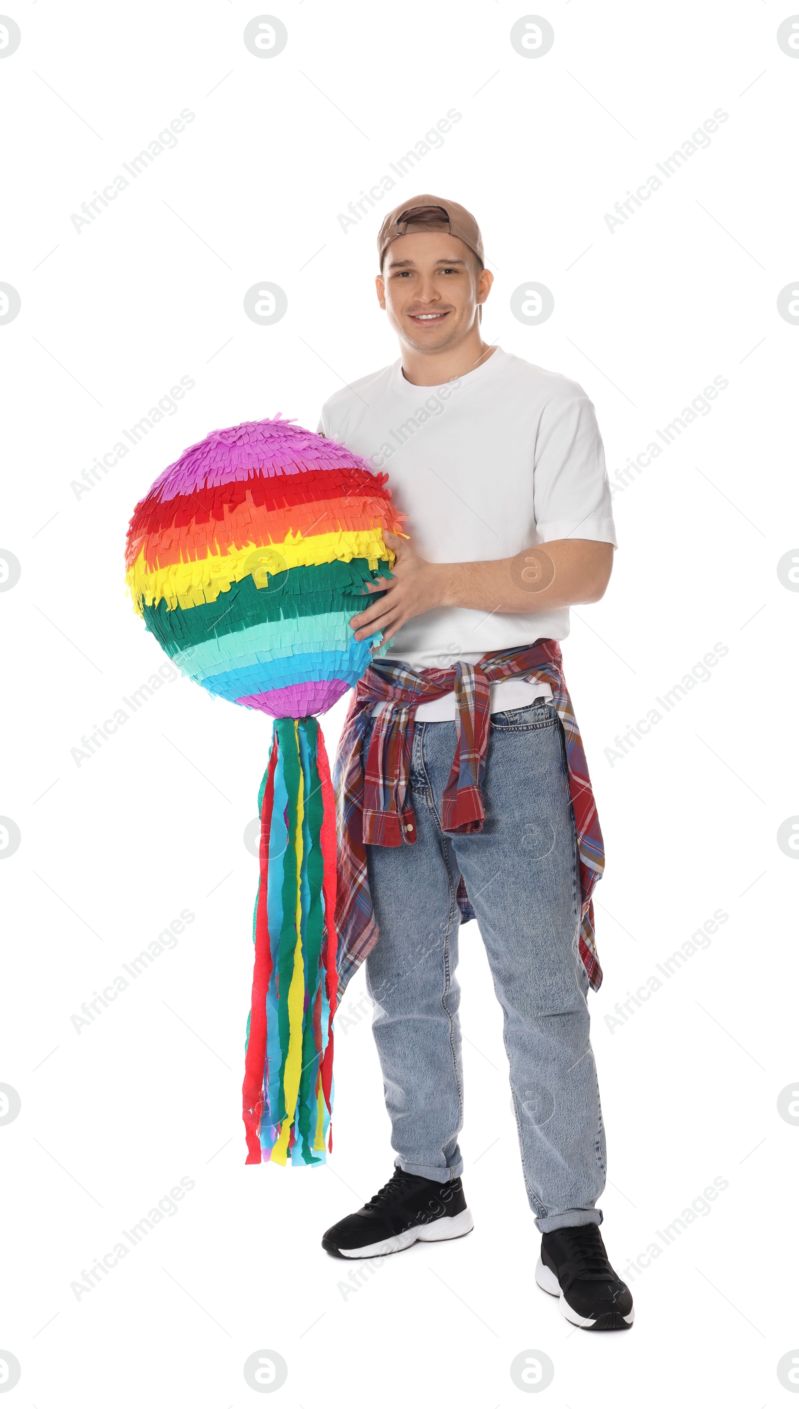 Photo of Happy man with colorful pinata on white background