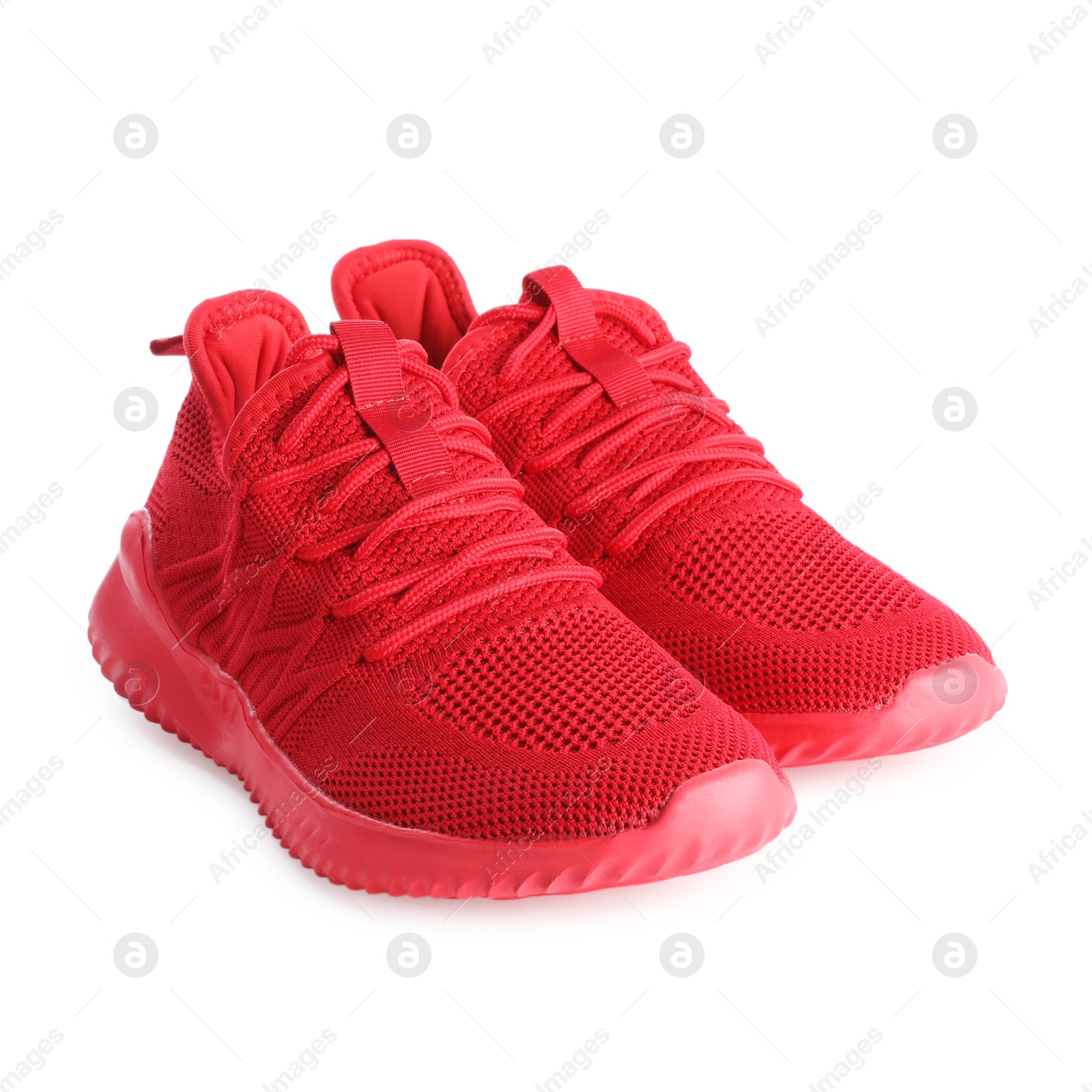 Photo of Pair of stylish red sneakers isolated on white