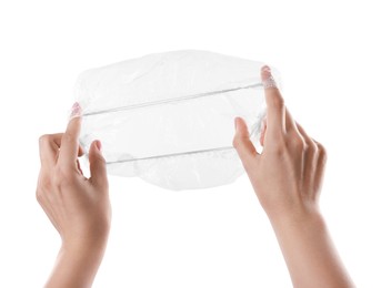 Photo of Woman with shower cap on white background, closeup