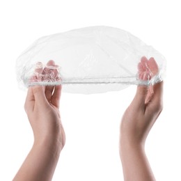 Photo of Woman with shower cap on white background, closeup