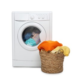 Photo of Modern washing machine and laundry basket isolated on white