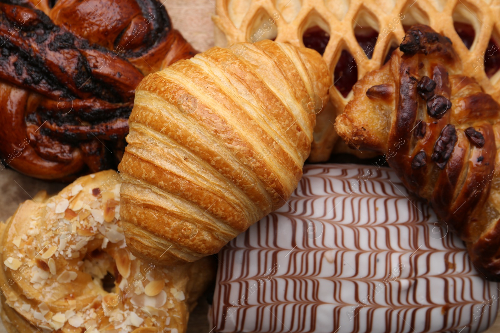 Photo of Different sweet pastries on table, top view