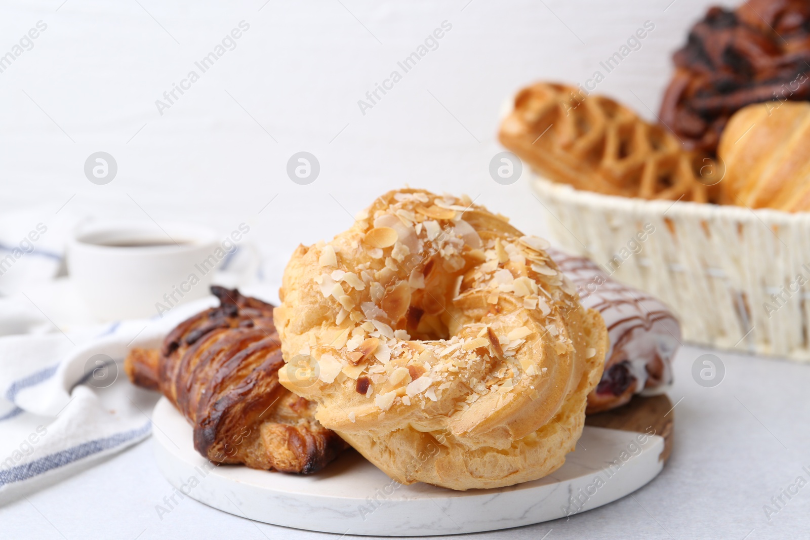 Photo of Different delicious sweet pastries on light table