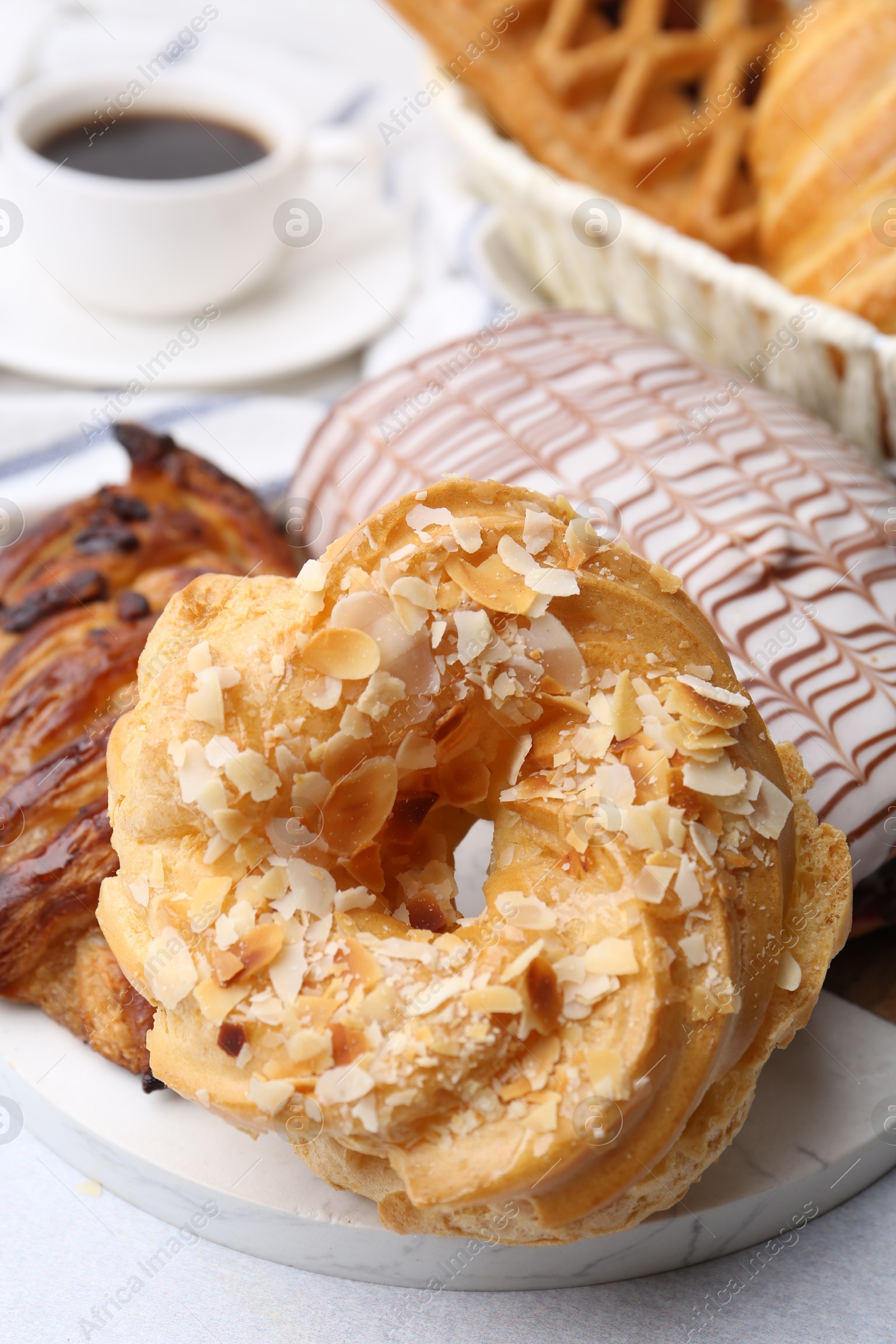 Photo of Different sweet pastries on light table, closeup