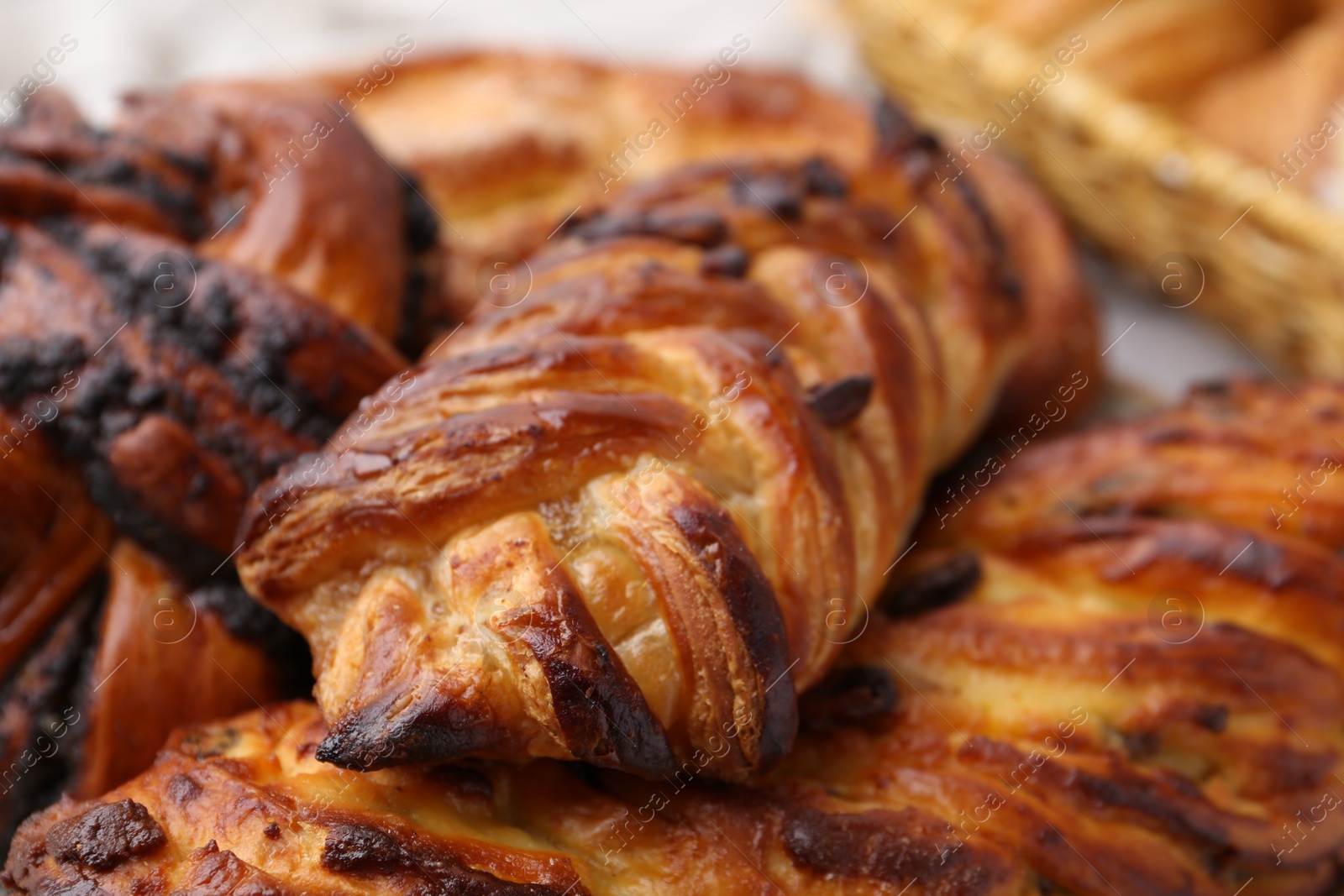 Photo of Different delicious sweet pastries on table, closeup