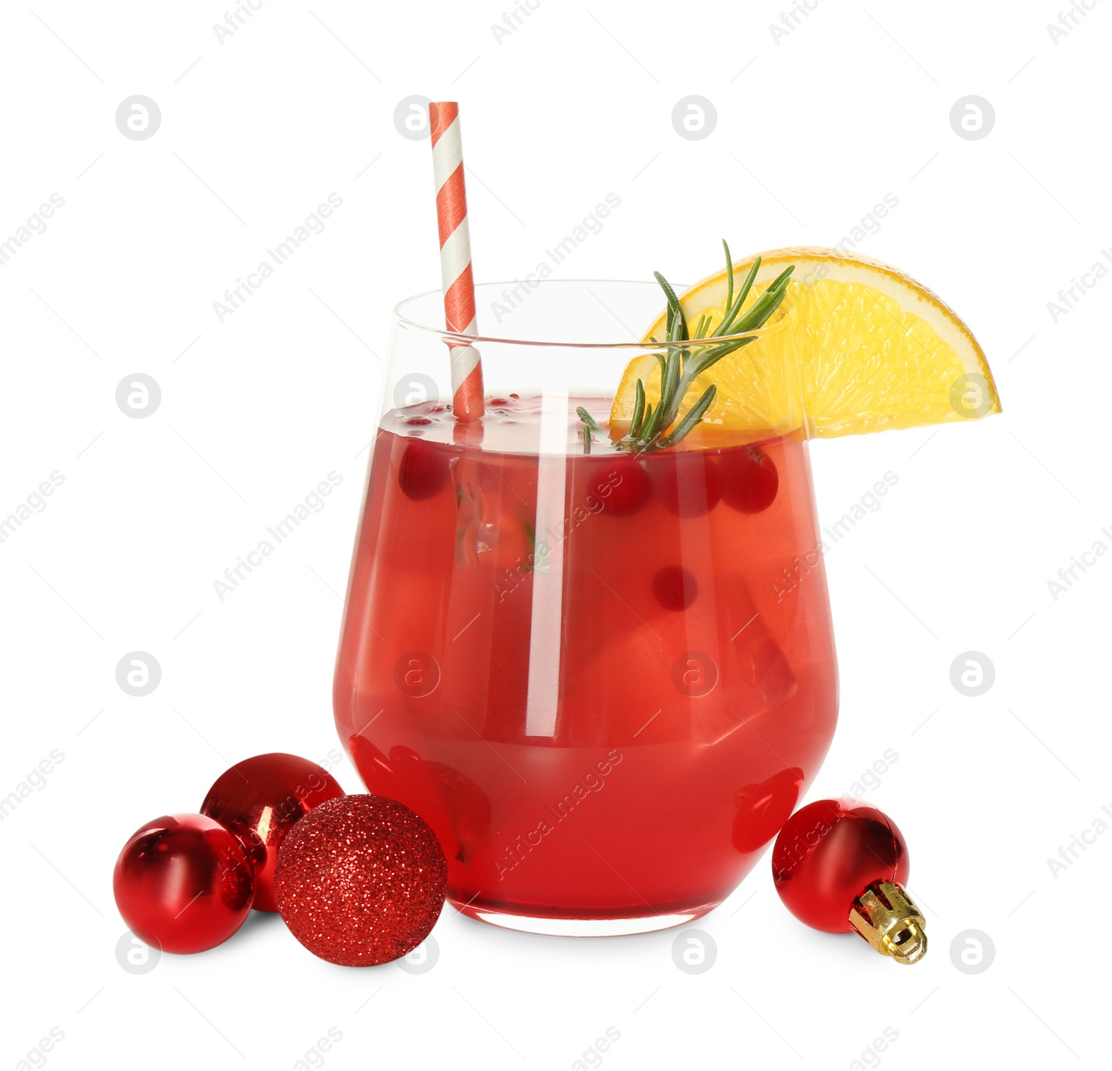 Photo of Tasty Christmas cocktail in glass and baubles isolated on white