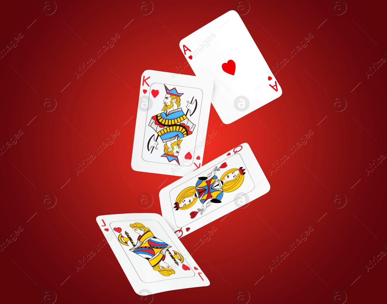 Image of Playing cards of hearts suit in air on red gradient background. Poker game