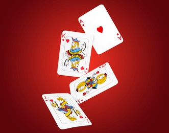 Image of Playing cards of hearts suit in air on red gradient background. Poker game