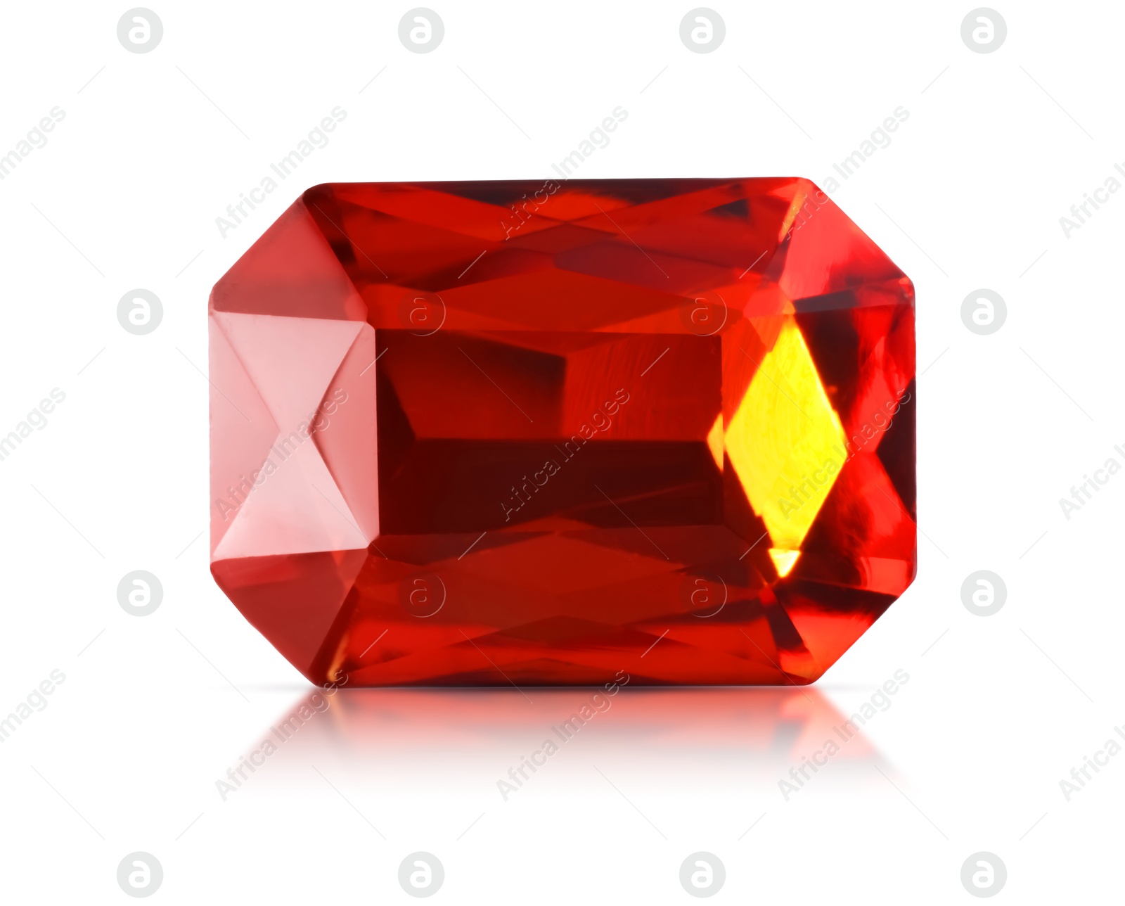 Image of One red shiny gemstone isolated on white