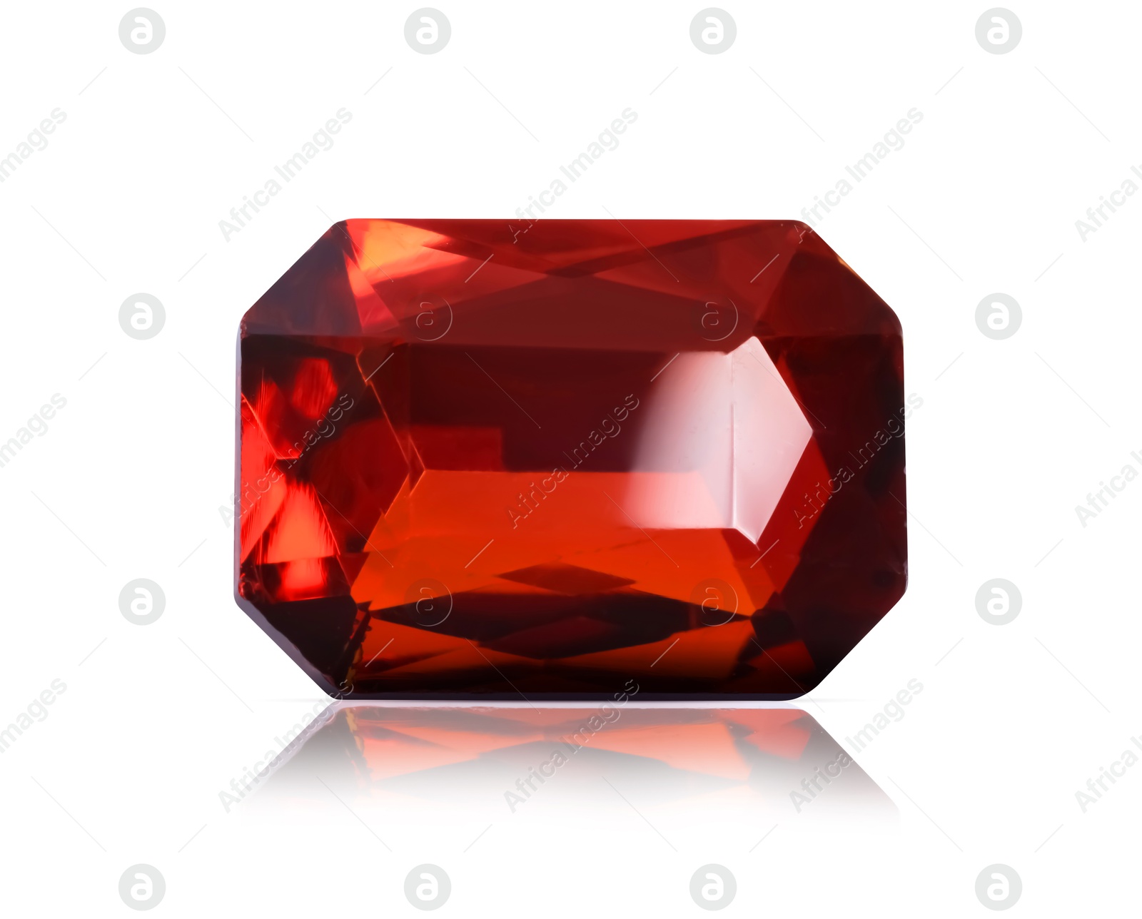 Image of One red shiny gemstone isolated on white