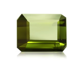 Image of One green shiny gemstone isolated on white