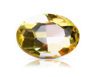 Image of One yellow shiny gemstone isolated on white