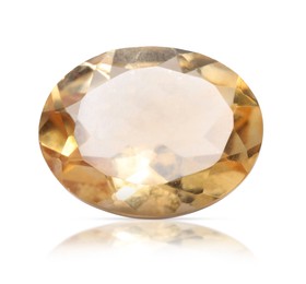 Image of One yellow-orange shiny gemstone isolated on white