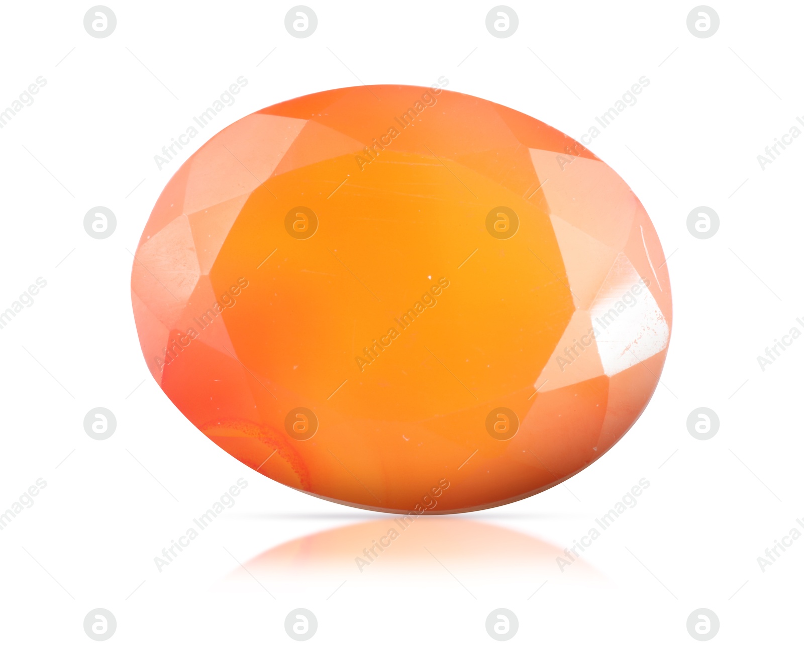 Image of One orange shiny gemstone isolated on white