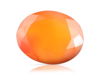 Image of One orange shiny gemstone isolated on white