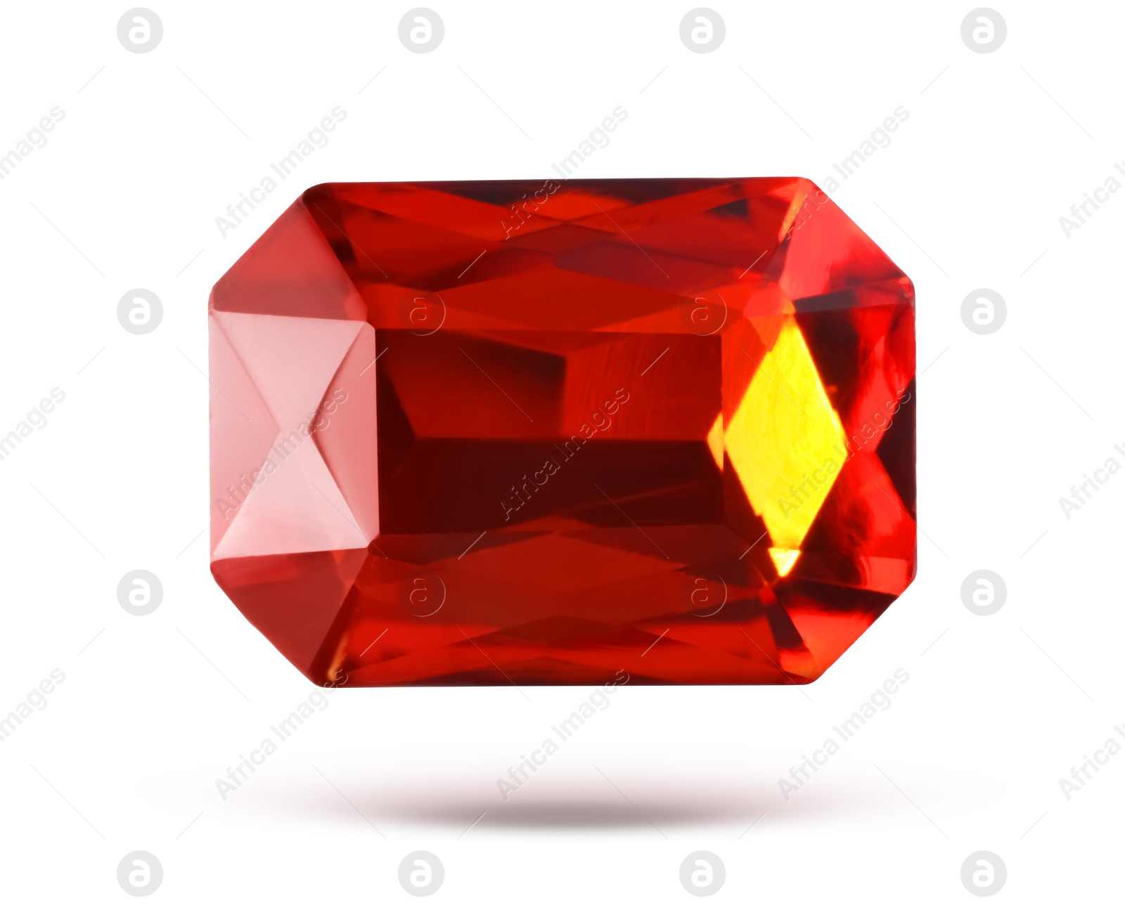 Image of Red shiny gemstone in air on white background