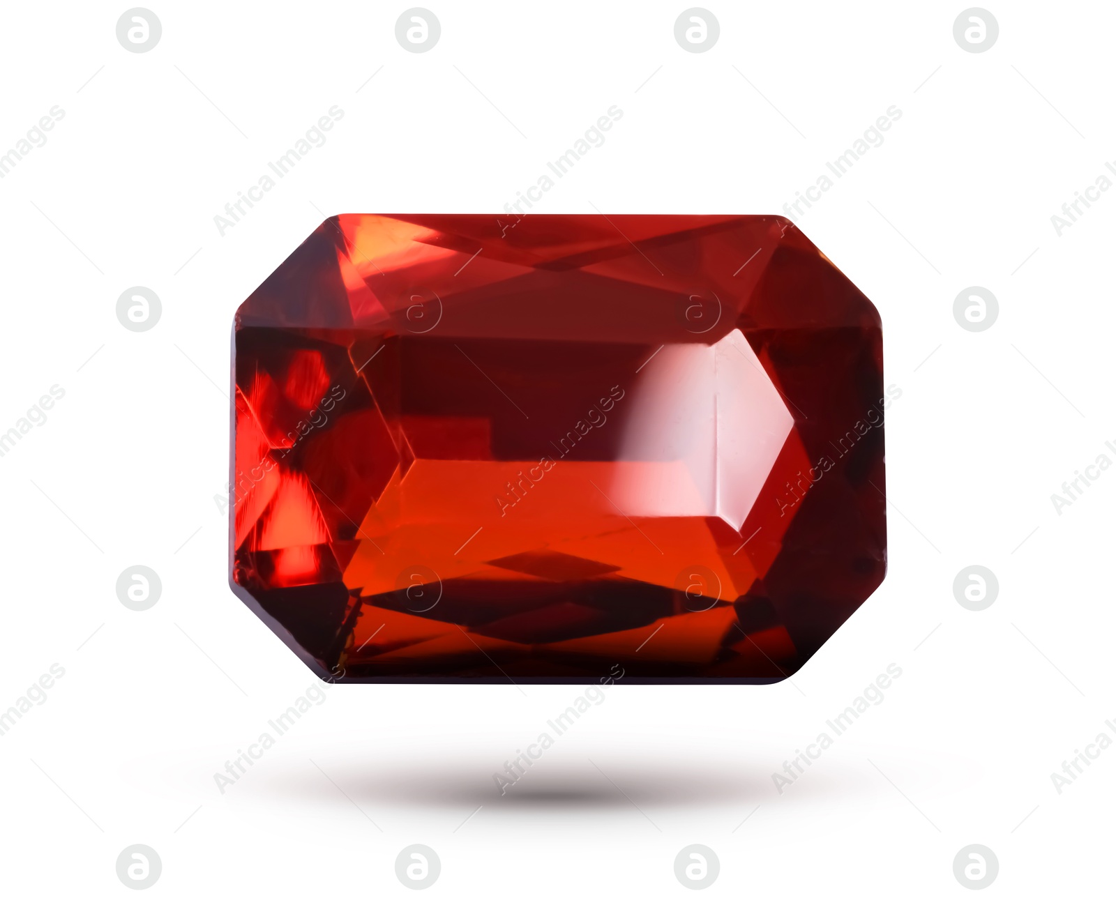 Image of Red shiny gemstone in air on white background