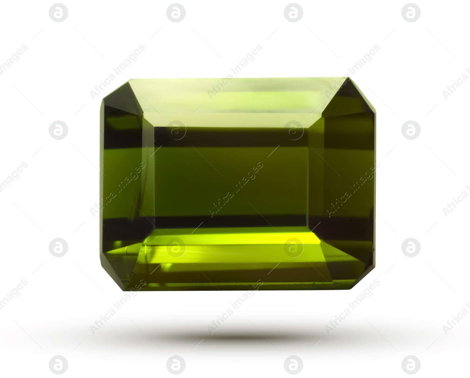 Image of One green shiny gemstone in air on white background